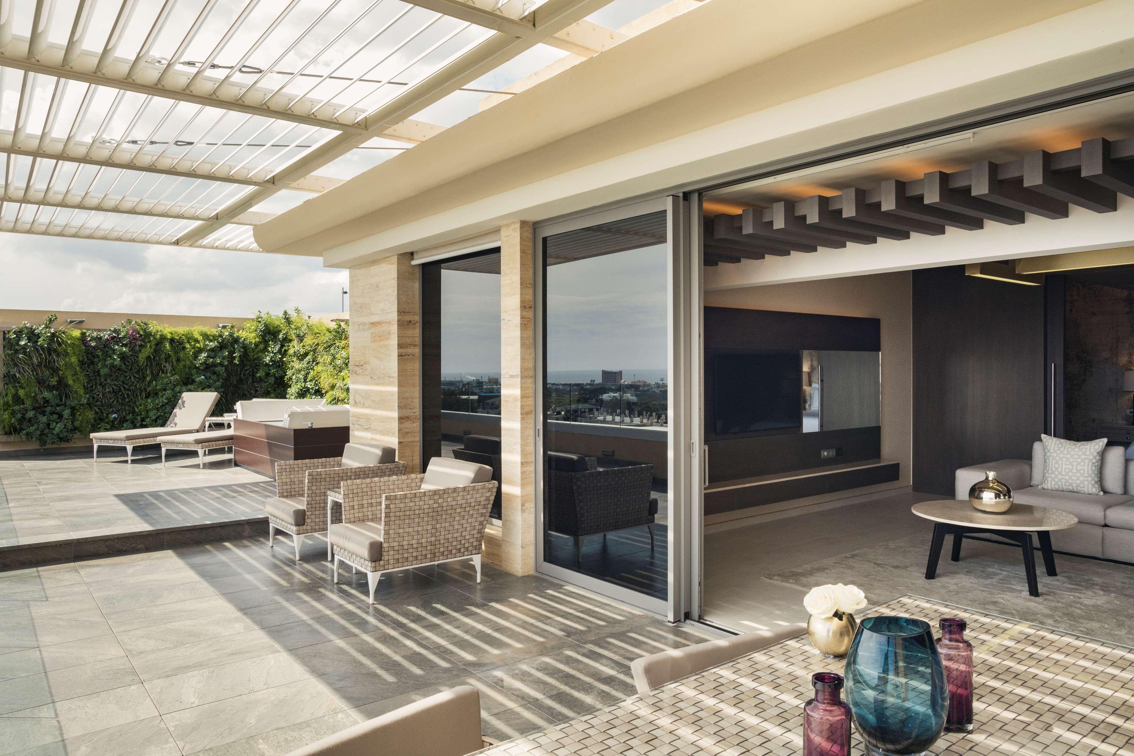 El Embajador, A Royal Hideaway Hotel Santo Domingo Zewnętrze zdjęcie A sliding door